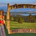 Lipnica Wielka - Marysina Polana, drewniana ramka i rzeźba, w tle Tatry i Jezioro Orawskie