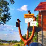 Słup z drogowskazami, Porąbka