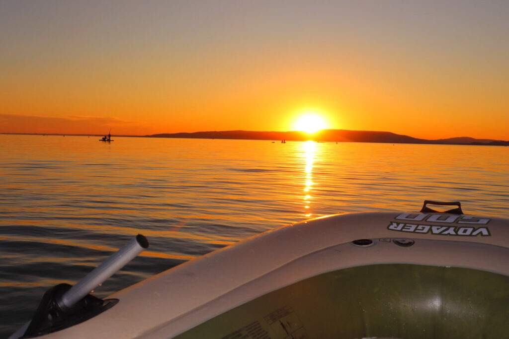 Zachód słońca, jezioro Balaton pontonem